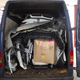 Image for article titled Here's Proof You Can Fit An Entire BMW X6 Into A Van